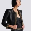Lammfelljacke mit Kettenbesatz Lammfelljacke mit Kettenbesatz
