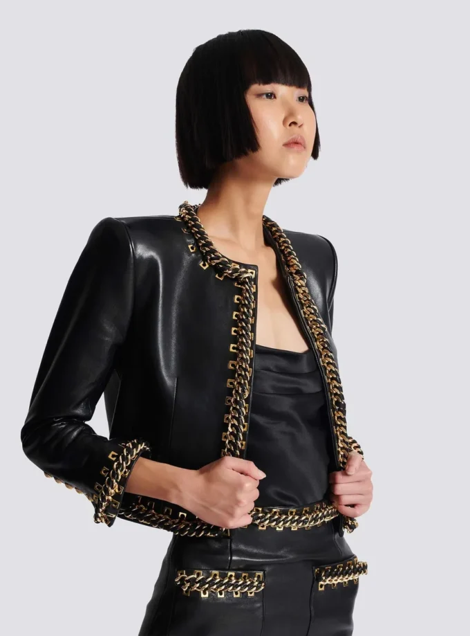 Lammfelljacke mit Kettenbesatz Lammfelljacke mit Kettenbesatz