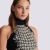Langes, besticktes Kleid mit Schlitz Langes, besticktes Kleid mit Schlitz