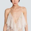 Langes, fließendes Kleid mit Spitzenrüschen Langes, fließendes Kleid mit Spitzenrüschen