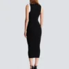 Langes zweifarbiges Kleid mit Zopfmuster Langes zweifarbiges Kleid mit Zopfmuster