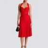 Midi-Kleid aus plissiertem Strick mit Neckholder Midi-Kleid aus plissiertem Strick mit Neckholder