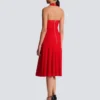 Midi-Kleid aus plissiertem Strick mit Neckholder Midi-Kleid aus plissiertem Strick mit Neckholder