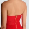Midi-Kleid aus plissiertem Strick mit Neckholder Midi-Kleid aus plissiertem Strick mit Neckholder