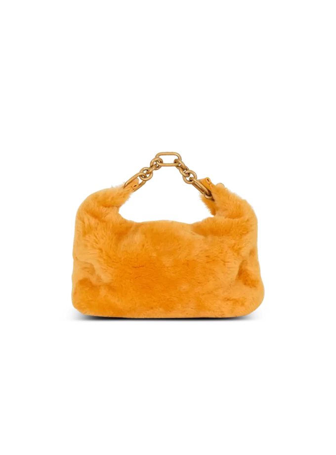 Mini Sync Tasche aus Lammfell Mini Sync Tasche aus Lammfell