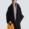 Mini Sync Tasche aus Lammfell Mini Sync Tasche aus Lammfell