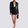 Minirock aus Lammleder mit hoher Taille und Rollsaum Minirock aus Lammleder mit hoher Taille und Rollsaum