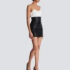 Minirock aus Lammleder mit hoher Taille und Rollsaum Minirock aus Lammleder mit hoher Taille und Rollsaum