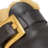Flache Mules aus Leder und Kunstfell Flache Mules aus Leder und Kunstfell