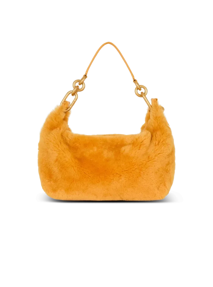 Mittlere Sync-Tasche aus Lammfell Mittlere Sync-Tasche aus Lammfell