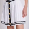 Plissierter Strickrock mit Monogramm Plissierter Strickrock mit Monogramm