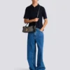Pulse Schultertasche aus Monogramm-Jacquard und Kalbsleder Pulse Schultertasche aus Monogramm-Jacquard und Kalbsleder