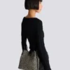 Release Beuteltasche aus Jacquard und Kalbsleder Release Beuteltasche aus Jacquard und Kalbsleder