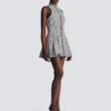 Ärmelloses, ausgestelltes Tweedkleid Ärmelloses, ausgestelltes Tweedkleid