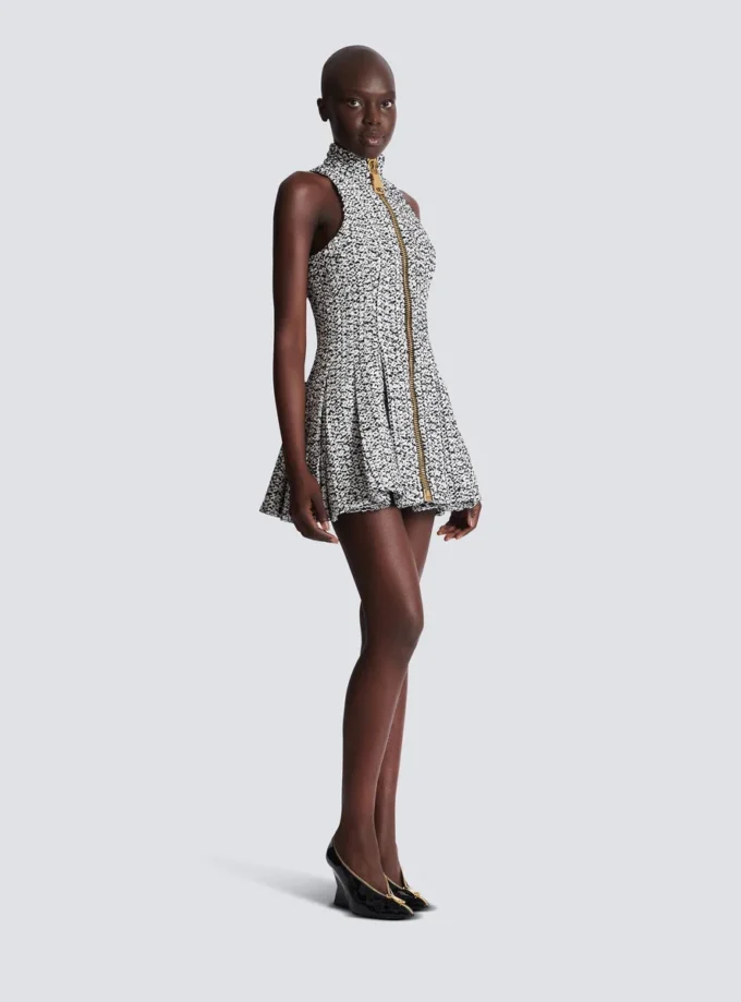 Ärmelloses, ausgestelltes Tweedkleid Ärmelloses, ausgestelltes Tweedkleid