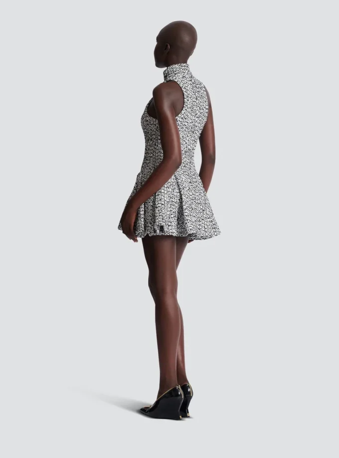 Ärmelloses, ausgestelltes Tweedkleid Ärmelloses, ausgestelltes Tweedkleid