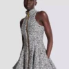 Ärmelloses, ausgestelltes Tweedkleid Ärmelloses, ausgestelltes Tweedkleid