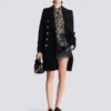 Rüschenbluse mit Leopardenmuster Rüschenbluse mit Leopardenmuster