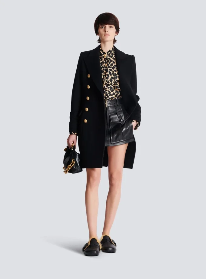Rüschenbluse mit Leopardenmuster Rüschenbluse mit Leopardenmuster