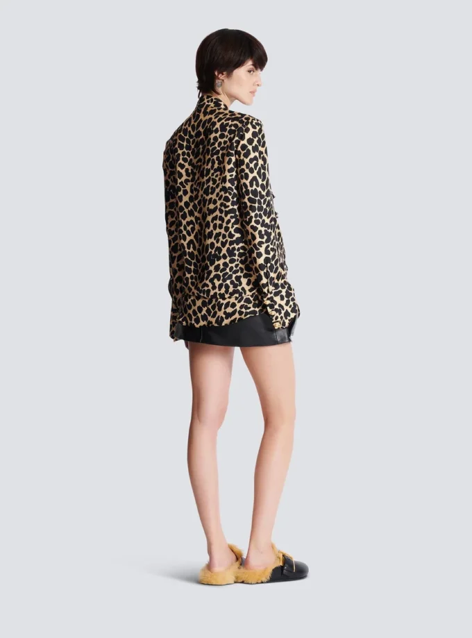 Rüschenbluse mit Leopardenmuster Rüschenbluse mit Leopardenmuster