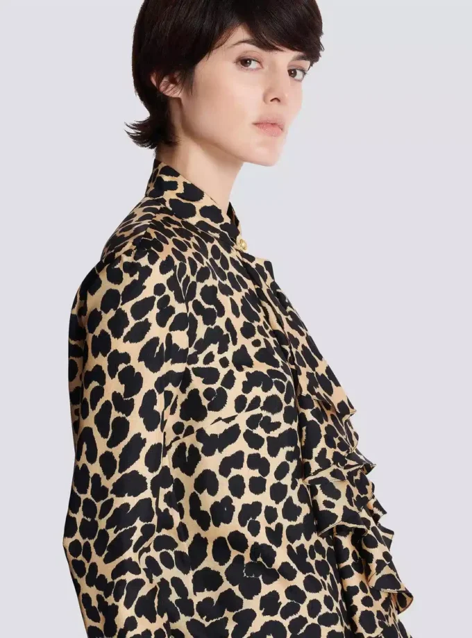Rüschenbluse mit Leopardenmuster Rüschenbluse mit Leopardenmuster