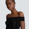 Schulterfreies Glitzer-Strickkleid Schulterfreies Glitzer-Strickkleid