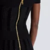 Schulterfreies Glitzer-Strickkleid Schulterfreies Glitzer-Strickkleid