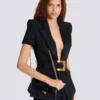 Shuffle-Brieftasche aus Kalbsleder mit Kette Shuffle-Brieftasche aus Kalbsleder mit Kette