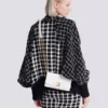 Shuffle-Brieftasche aus Kalbsleder mit Kette Shuffle-Brieftasche aus Kalbsleder mit Kette
