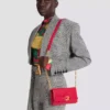 Shuffle-Brieftasche aus Kalbsleder mit Kette Shuffle-Brieftasche aus Kalbsleder mit Kette