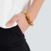 Sync-Armband aus Messing in Bambusoptik