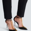 Sync-Stilettos aus Lackleder