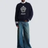 Weite Jeanshose aus verblasstem Denim Weite Jeanshose aus verblasstem Denim