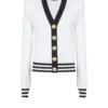 Zweifarbige Strickjacke mit Monogramm Zweifarbige Strickjacke mit Monogramm